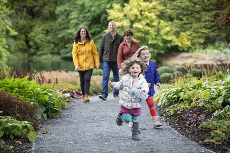 Family enjoying a stroll around the gardens at Montalto Estate.